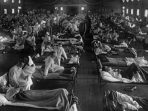 Pasien influenza di rumah sakit darurat dekat Camp Funston (sekarang Fort Riley) di Kansas pada tahun 1918. Foto: AP Photo/National Museum of Health.